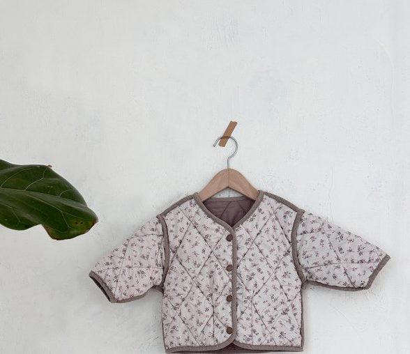 Reversible quilted snap front jacket