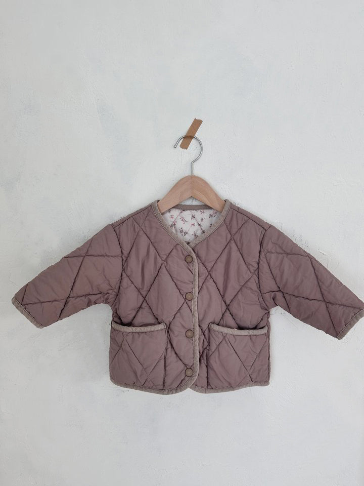 Reversible quilted snap front jacket